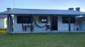 Casa aconchegante na Praia da Ferrugem